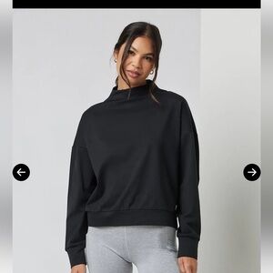 Vuori Granite Funnel Neck in Black. Size medium